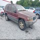 1J4GW48S0YC195449 2000 Jeep Grand Cherokee Laredo auction photo thumbnail 1