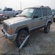 1J4FF48S01L569382 2001 Jeep Cherokee Sport auction photo thumbnail 2