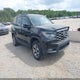 5FNYF8H63PB028394 2023 Honda Passport Awd Trailsport auction photo thumbnail 1