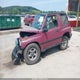2CNBJ1869T6948411 1996 Geo Tracker auction photo thumbnail 2