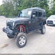 1C4HJWFG8EL314511 2014 Jeep Wrangler Unlimited Rubicon X auction photo thumbnail 2