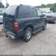 1GNEK13Z43J166270 2003 Chevrolet Tahoe Lt auction photo thumbnail 4