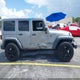 1C4BJWDG8FL585126 2015 Jeep Wrangler Unlimited Sport auction photo thumbnail 13