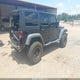 1C4BJWDG8EL185971 2014 Jeep Wrangler Unlimited Sport auction photo thumbnail 4