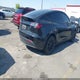 7SAYGDEE8PF616876 2023 Tesla Model Y Awd/Long Range Dual Motor All-Wheel Drive auction photo thumbnail 4