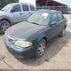 1YVGF22C725267068 2002 Mazda 626 Lx auction photo thumbnail 2