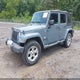 1C4HJWEG0FL547673 2015 Jeep Wrangler Unlimited Sahara auction photo thumbnail 2