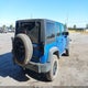 1C4HJWDG1GL237065 2016 Jeep Wrangler Unlimited Willys Wheeler auction photo thumbnail 4