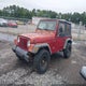 1J4FY29P3XP470291 1999 Jeep Wrangler Se auction photo thumbnail 2