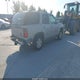 1GNEK13TX5J169169 2005 Chevrolet Tahoe Lt auction photo thumbnail 4