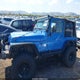 1J4FA49S32P770815 2002 Jeep Wrangler Sport auction photo thumbnail 14