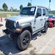 1C4HJXDN5NW226876 2022 Jeep Wrangler Unlimited Sport 4X4 auction photo thumbnail 2