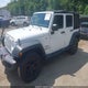 1C4BJWDG5GL156172 2016 Jeep Wrangler Unlimited Sport auction photo thumbnail 2