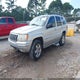 1J8GW68J93C512915 2003 Jeep Grand Cherokee Overland auction photo thumbnail 2