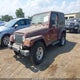 1J4FA59S24P738401 2004 Jeep Wrangler Sahara auction photo thumbnail 2