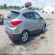 KM8JUCACXBU213998 2011 Hyundai Tucson Limited auction photo thumbnail 4