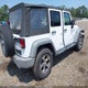 1C4HJWDG4FL577311 2015 Jeep Wrangler Unlimited Sport auction photo thumbnail 4