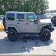 1C4HJWEG1GL180705 2016 Jeep Wrangler Unlimited Sahara auction photo thumbnail 14
