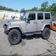 1C4HJWEG1GL180705 2016 Jeep Wrangler Unlimited Sahara auction photo thumbnail 15