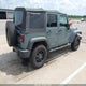 1C4BJWDG4EL135438 2014 Jeep Wrangler Unlimited Sport auction photo thumbnail 4