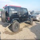 1C4BJWEG4FL688560 2015 Jeep Wrangler Unlimited Altitude auction photo thumbnail 4