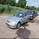 1HGEJ6677XL017141 1999 Honda Civic Lx auction photo thumbnail 2