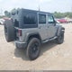 1C4BJWEGXEL220198 2014 Jeep Wrangler Unlimited Sahara auction photo thumbnail 4