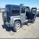 1C4HJWEG5FL776866 2015 Jeep Wrangler Unlimited Sahara auction photo thumbnail 4