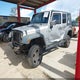 1J4BA3H12AL125466 2010 Jeep Wrangler Unlimited Sport auction photo thumbnail 2