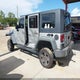 1J4BA3H12AL125466 2010 Jeep Wrangler Unlimited Sport auction photo thumbnail 3