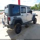 1J4BA3H12AL125466 2010 Jeep Wrangler Unlimited Sport auction photo thumbnail 4