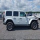 1C4HJXEG7KW589112 2019 Jeep Wrangler Unlimited Sahara auction photo thumbnail 12