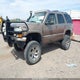 1GNEK13Z24R211659 2004 Chevrolet Tahoe Lt auction photo thumbnail 2