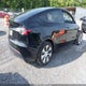 7SAYGDEE7PF825882 2023 Tesla Model Y Awd/Long Range Dual Motor All-Wheel Drive auction photo thumbnail 4