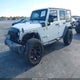 1C4BJWDG0GL175812 2016 Jeep Wrangler Unlimited Sport auction photo thumbnail 2