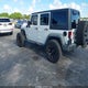 1C4BJWDG0GL175812 2016 Jeep Wrangler Unlimited Sport auction photo thumbnail 3