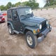 1J4FA59S63P303749 2003 Jeep Wrangler Sahara auction photo thumbnail 1