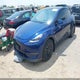 7SAYGDEE7PA162360 2023 Tesla Model Y Awd/Long Range Dual Motor All-Wheel Drive auction photo thumbnail 2