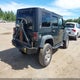 1J4BA3H15AL212956 2010 Jeep Wrangler Unlimited Sport auction photo thumbnail 4