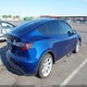7SAYGAEE6NF340712 2022 Tesla Model Y Long Range Dual Motor All-Wheel Drive auction photo thumbnail 4