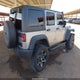 1C4BJWDG2EL269851 2014 Jeep Wrangler Unlimited Sport auction photo thumbnail 4