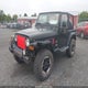 1J4FA59S49P767670 2004 Jeep Wrangler auction photo thumbnail 2