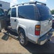 3GNFK16Z34G147602 2004 Chevrolet Suburban 1500 Z71 auction photo thumbnail 3