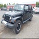 1J4BA5H11AL156817 2010 Jeep Wrangler Unlimited Sahara auction photo thumbnail 2