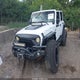 1C4BJWEG2FL590739 2015 Jeep Wrangler Unlimited Wrangler X auction photo thumbnail 2