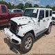 1C4HJWEGXEL229459 2014 Jeep Wrangler Unlimited Sahara auction photo thumbnail 2