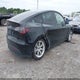 7SAYGDEE8PA171469 2023 Tesla Model Y Awd/Long Range Dual Motor All-Wheel Drive auction photo thumbnail 4
