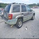 1J4GW58NIXC657192 1999 Jeep Grand Cherokee Laredo auction photo thumbnail 4