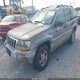 1J4GW58NIXC657192 1999 Jeep Grand Cherokee Laredo auction photo thumbnail 6
