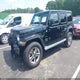 1C4HJXEG3KW637690 2019 Jeep Wrangler Unlimited Sahara 4X4 auction photo thumbnail 2